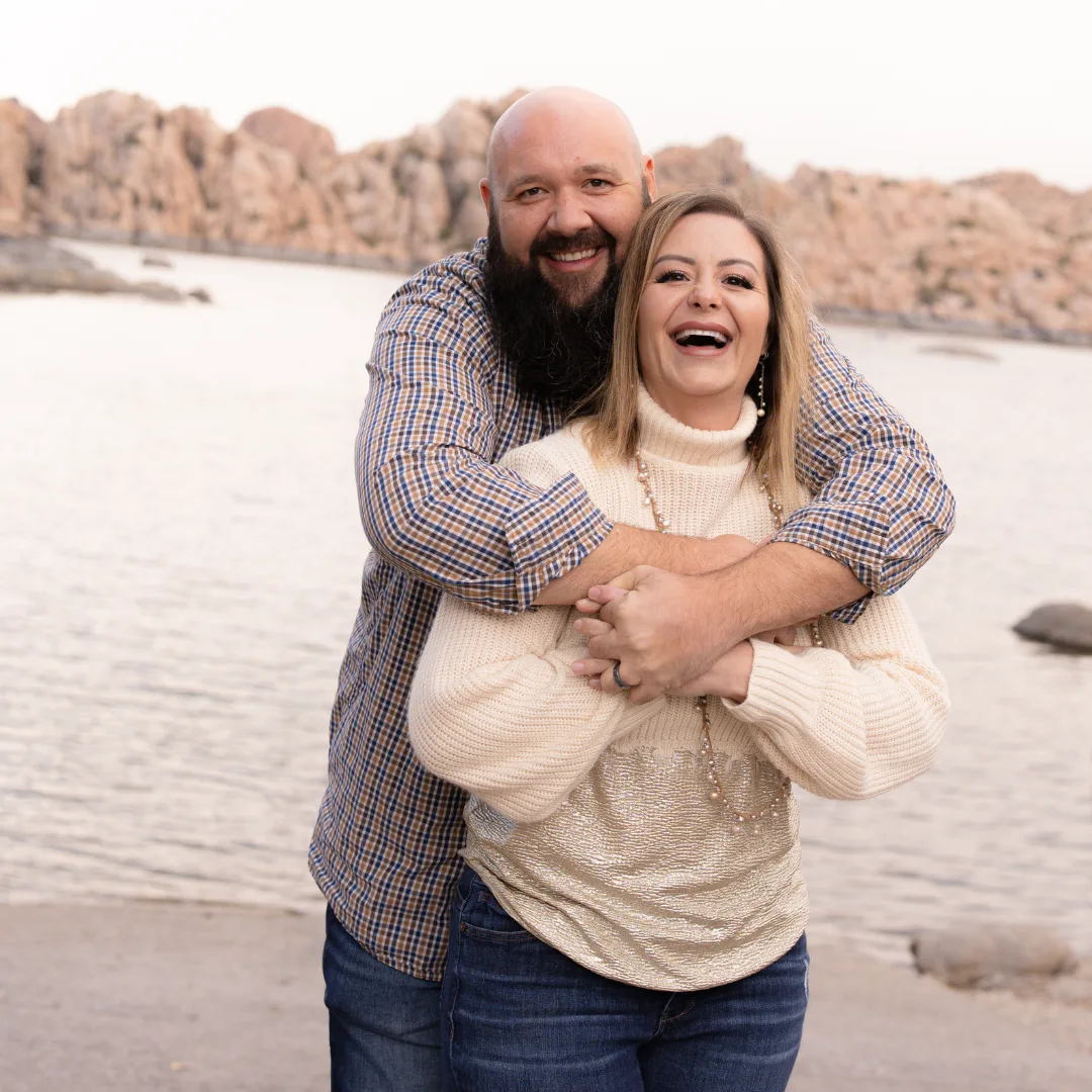 Derek and Esther DiCamillo by a lake